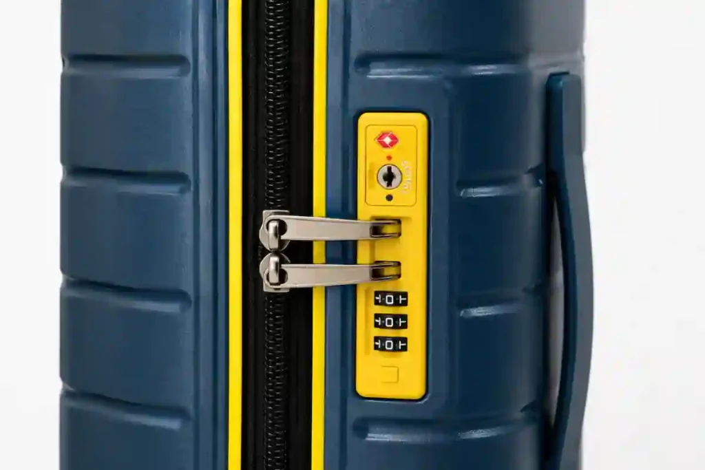 Comparison of a TSA-approved lock and a standard suitcase lock