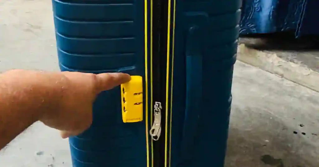 Checking zipper quality on a trolley bag